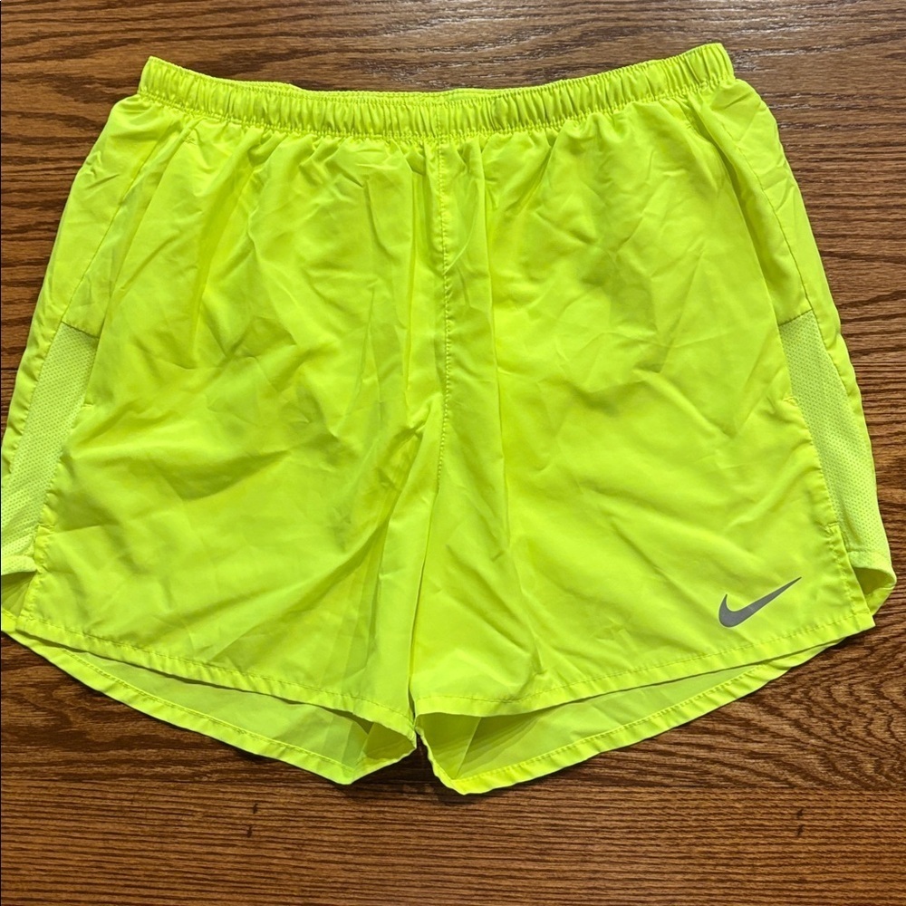 Nike women’s Fluorescent neon Yellow Running Shorts pockets NWOT attach brief L